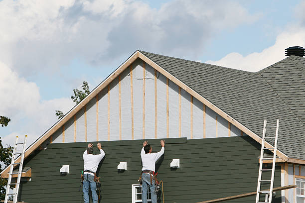 Professional Siding Contractor technician working in Commack, NY